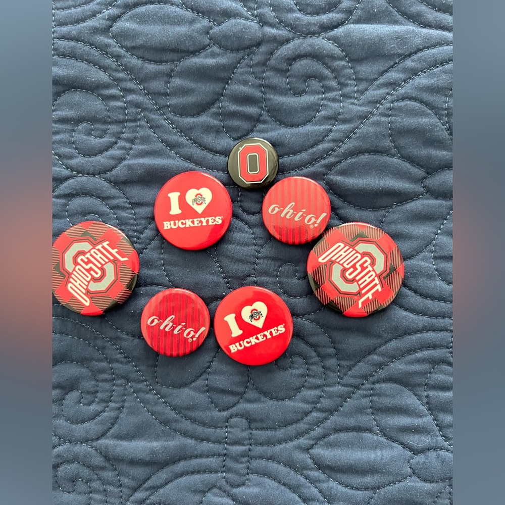 Set of 7 Ohio state pins.  Go Buckeyes.  Sold altogether.  Doubles of each
